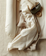 Mio musselin stofbleer, Mini Check